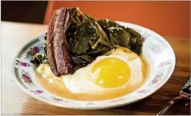  ?? PHOTOS CONTRIBUTE­D BY MIA YAKEL ?? Mary Hoopa’s polenta with braised bacon, an egg and collard greens.