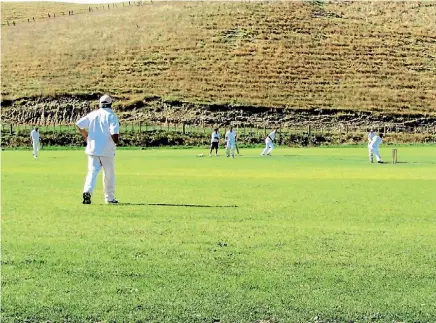  ??  ?? The Cambridge Antiques cricket team playing an away game against Clifton, in the over 40s competitio­n. Masters cricket is growing in popularity in New Zealand, Australia and England.