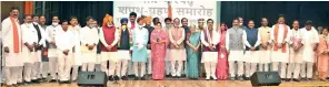  ??  ?? Madhya Pradesh Governor Anandiben Patel and Chief Minister Shivraj Chouhan with the newly inducted ministers, after the swearing-in ceremony at Raj Bhawan in Bhopal, on Thursday