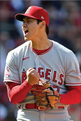  ?? MATT STONE / HERALD STAFF ?? TWO-WAY STREET: Angels pitcher Shohei Ohtani screams out after striking out Trevor Story to end the seventh inning at Fenway Park on Thursday afternoon.