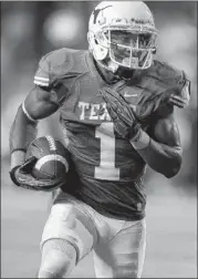  ?? DEBORAH CANNON / AMERICAN-STATESMAN ?? Texas’ Mike Davis finished seventh in the Big 12 with 75.8 receiving yards per game as junior. He also had seven touchdowns.