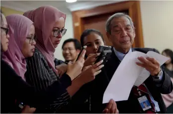  ??  ?? Ab Rashid (right) speaks to the media after chairing the ERC’s first meeting. — Bernama photo