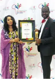  ??  ?? Fisayo Duduyemi, chief strategy officer, Axxela Limited, receiving the award on behalf of the company