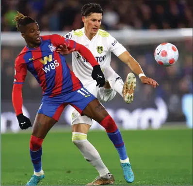  ?? ?? Wilfried Zaha jostles for possession with Robin Koch during the stalemate at Selhurst Park