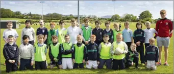  ??  ?? Coach Oran McDonagh with the young players.