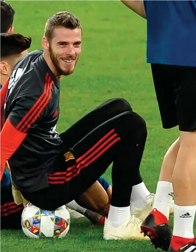  ??  ?? David De Gea is all smiles at training ahead of Spain’s friendly against England