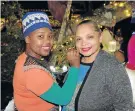  ?? Picture: SALVELIO MEYER ?? TASTE OF AFRICA: Asanda Scout from African Drumbeat painted the face of Sadie Isaacs of Nelson Mandela Bay Tourism at last Wednesday’s launch of the Xhosa Cultural Experience at The Boma in Lovemore Park