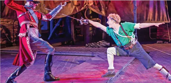  ??  ?? Hooked: Dennis Herdman and Sam Angell cross swords in Peter Pan