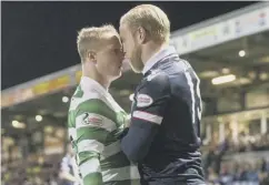  ??  ?? 0 Celtic’s Leigh Griffiths and County’s Andrew Davies square up.