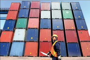  ?? XINHUA, REUTERS AND WEI TONG / FOR CHINA DAILY ?? Clockwise from top: The first Beijing-Tianjin inter-city tourist railway line is launched on June 15, 2016. A worker walks past containers at Tianjin Port in northern China on May 13, 2010. Workers assemble vehicles at BAIC Group’s Huanghua plant in...