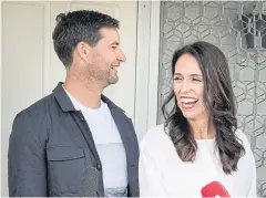  ?? REUTERS ?? New Zealand Prime Minister Jacinda Ardern and her partner Clarke Gayford announce their pregnancy with their first child to media at a press conference in Auckland.