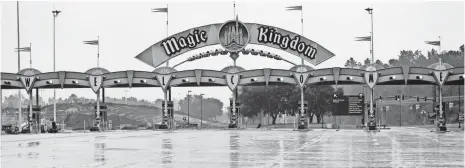  ?? JOHN RAOUX, AP ?? On Sunday, the gates to the Magic Kingdom were a far cry from the happiest place on Earth as Hurricane Irma bore down on Florida. The Magic Kingdom, Epcot, Animal Kingdom and Disney Hollywood Studios all open at 9 a.m. Tuesday.