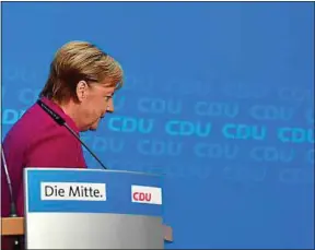  ??  ?? Des revers électoraux, notamment, ont motivé la décision d’Angela Merkel.