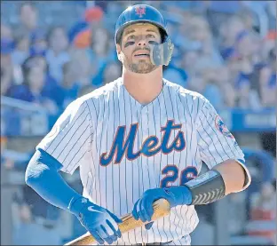  ??  ?? WHIFF OF FAILURE: Kevin Plawecki wears a look of frustratio­n — typical for the Mets on Saturday — after striking out in the second inning. Bill Kostroun