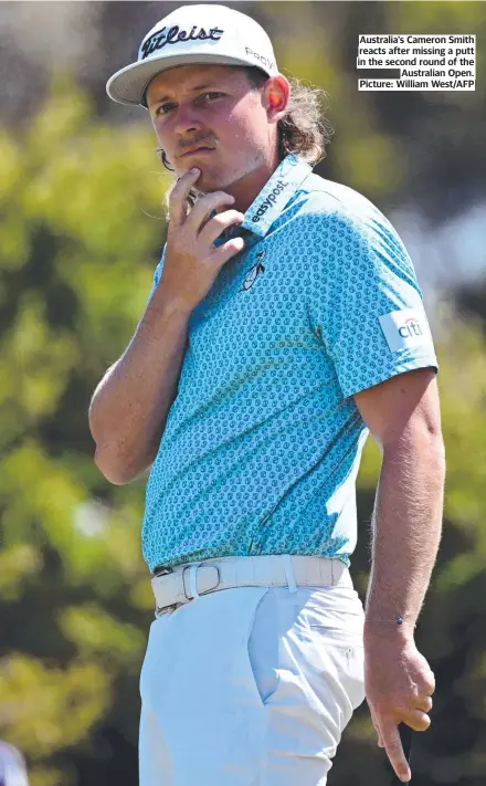 ?? Picture: William West/AFP ?? Australia's Cameron Smith reacts after missing a putt in the second round of the Australian Open.