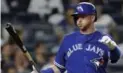  ?? ADAM HUNGER/USA TODAY SPORTS ?? Justin Smoak leads the Blue Jays in hits, homers, RBIs, slugging percentage and OPS.