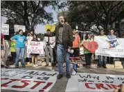  ?? RICARDO B. BRAZZIELL / AMERICAN-STATESMAN ?? Ken Zarifis, president of Education Austin, the school district’s teachers union, takes part Monday in a protest of the “sanctuary cities” law outside the Governor’s Mansion in Austin.
