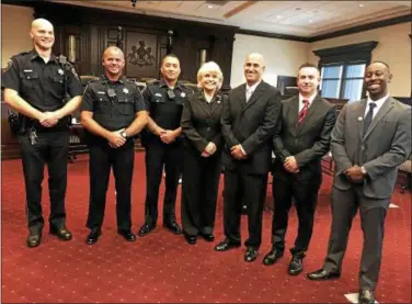  ?? SUBMITTED PHOTO ?? Members of the Chester County Sheriff’s Office command staff, Lt. Adam Sibley, from left, Lt. Kurt Hansen, Chief Deputy Jason Suydam, and Sheriff Carolyn “Bunny” Welsh welcome Deputy Sheriff Sean Marasco, Deputy Sheriff Arthur Adams and Deputy Sheriff Asim John.