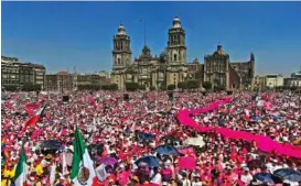  ?? AP PHOTO/FERNANDO LLANO ?? Anti-government demonstrat­ors protest Sunday against recent reforms pushed by President Andres Manuel Lopez Obrador to the country’s electoral law that they say threaten democracy, in Mexico City’s main square, the Zocalo.