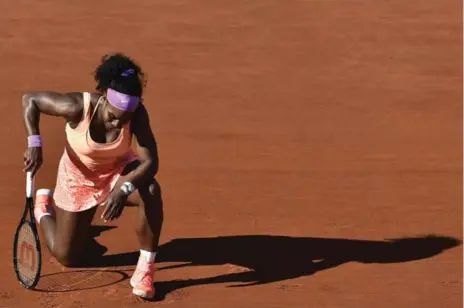  ?? DOMINIQUE FAGET/AFP/GETTY IMAGES ?? Serena Williams was down a set and a break to Switzerlan­d’s Timea Bacsinszky before finally finding the energy to win her semifinal match.