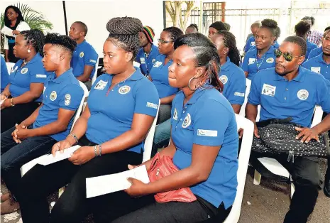  ??  ?? Some of the 25 participan­ts graduating from the Clarendon Municipal Corporatio­n’s (CMC) three-month Clarendon Youth In Business training programme. The graduation ceremony was held at the CMC in May Pen last week.