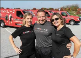  ?? PETE BANNAN — DIGITAL FIRST MEDIA ?? Kristina Conway, Mark “Spark” Vandzura and Stacie Johns-Fink are bringing GYMGUYZ to Chester, Bucks and Montgomery counties.