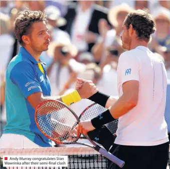  ??  ?? Andy Murray congratula­tes Stan Wawrinka after their semi-final clash