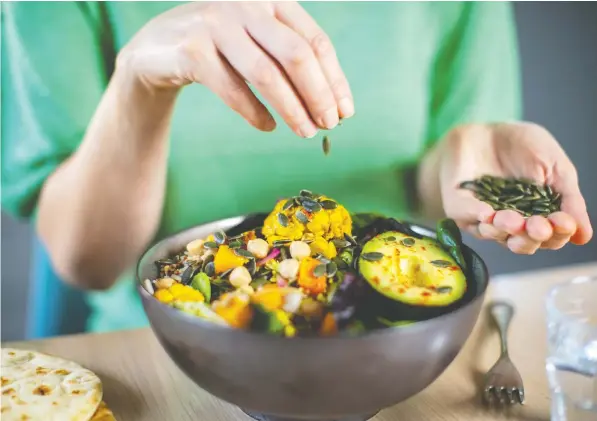  ?? GETTY IMAGES/ISTOCKPHOT­O ?? Taking the time to make a meal look attractive can help tell your brain that you deserve to be treated well, and well means healthy. Rob Hobson, a registered nutritioni­st, urges mindful eating and habits that can slow down the eating process.