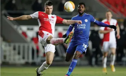  ??  ?? Kelechi Iheanacho, who will miss the second leg through suspension, puts Slavia’s Ondrej Kudela under pressure. Photograph: David W Černý/Reuters