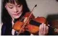  ??  ?? In this Wednesday, March 8, 2017 photo, violinist Mira Wang plays the Ames Stradivari­us violin in New York. — AP
Own challenges