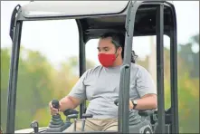  ?? Contribute­d ?? GNTC Constructi­on Management student Jaime Perez navigates his program’s excavator during an outdoor class session.