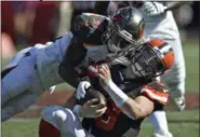  ?? JASON BEHNKEN — THE ASSOCIATED PRESS ?? Buccaneers defensive back Jordan Whitehead (31) hits Baker Mayfield during the second half on Oct. 21. Whitehead is expected to be fined for his helmet-tohelmet hit.