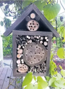  ?? KELLY MCDOWELL/SPECIAL TO THE EXAMINER ?? Bee hotels, like this one from Three Sisters, provide nesting sites for native solitary bees.