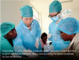  ??  ?? December 10, 2014: Chinese medical workers provide infusion training to local doctors in Freetown, Sierra Leone during the Ebola outbreak. by Dai Xin/xinhua