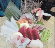  ??  ?? Chef’s Choice Sashimi is a feast for the eyes.
