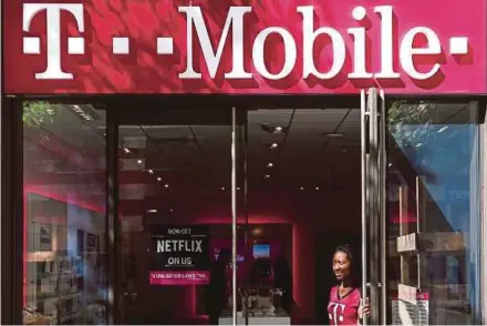  ?? REUTERS PIC ?? T-Mobile say the prospect of combining with Sprint is compelling, but they ended talks because the companies ‘were unable to find mutually agreeable terms’.