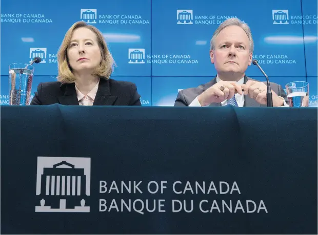  ?? ADRIAN WYLD / THE CANADIAN PRESS ?? Bank of Canada senior deputy governor Carolyn Wilkins and governor Stephen Poloz field questions in Ottawa last week after the bank raised its trend-setting interest rate for the third time since last summer. Uncertaint­ies over NAFTA to cloud the...