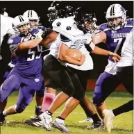  ?? Dave Phillips/Hearst Connecticu­t / ?? Nathaniel Reid of SMSA (22) carries the ball against North Branford on Friday.