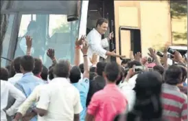 ?? ARIJIT SEN/HT PHOTO ?? Congress president Rahul Gandhi interacts with the public during his roadshow from Tikota to Bijapur in electionbo­und Karnataka on Saturday,