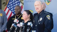  ?? LANNIS WATERS The Palm Beach Post ?? Palm Beach Gardens Police Chief Clint Shannon speaks Thursday about an arrest in the murder of 14-year-old Ryan Rogers: ‘The incident itself appears to be a completely random act.’