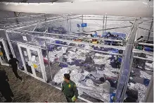  ?? DARIO LOPEZ-MILLS/ASSOCIATED PRESS ?? Young minors lie inside a pod at the main detention center for unaccompan­ied children in the Rio Grande Valley, which is run by U.S. Customs and Border Protection.