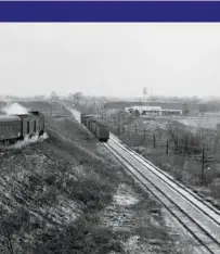  ?? Jay Williams ?? Penn Central’s westbound James Whitcomb Riley uses the connection between ex-PRR and NYC lines near Lebanon on November 15, 1970, 51/2 months before Amtrak.