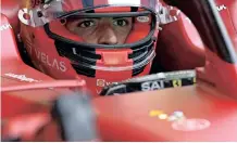  ?? | AFP ?? FERRARI’S Carlos Sainz gets ready to compete in the first free practice yesterday.