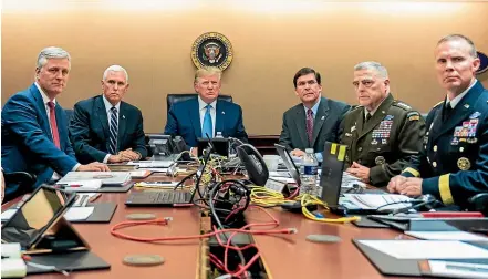  ?? AP ?? In this photo provided by the White House, President Donald Trump is joined by from left, national security adviser Robert O’Brien, Vice President Mike Pence, Defence Secretary mark Esper, Joint Chiefs Chairman Gen. Mark Milley and Brigadier General Marcus Evans, Deputy Director for Special Operations on the Joint Staff, in the Situation Room of the White House in Washington. The group monitored developmen­ts in the raid in which Special Operations forces killed Islamic State leader Abu Bakr al-Baghdadi.