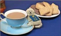  ?? ?? Pawsing for a cuppa...Guide Dogs plan tea parties