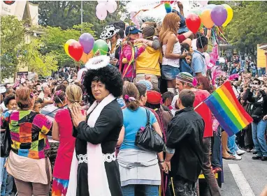  ??  ?? SHOWING PRIDE: LGBT delegates from all walks of life join the celebratio­ns at a previous Pink Loerie Mardi Gras and Arts Festival