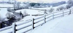  ??  ?? White-out: Snow-covered fields in County Durham yesterday