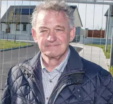  ??  ?? Peter Casey visiting Cabragh Bridge Traveller houses in Thurles last week.