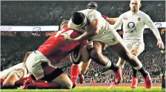  ??  ?? Seeing red: Manu Tuilagi makes his hit on George North (above) and is sent off (right)