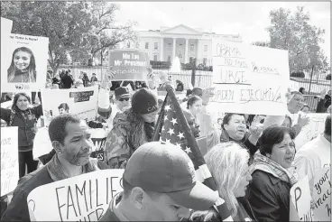  ?? JACQUELYN MARTIN/ASSOCIATED PRESS ?? Protesters rallied for comprehens­ive immigratio­n reform outside the White House in Washington earlier this month. President Barack Obama is poised to act soon to overhaul the nation’s immigratio­n system and unveil a series of executive actions that...